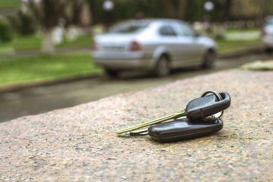 Mobile auto locksmith in Houston TX holding replacement car keys - Tony's Keys Express